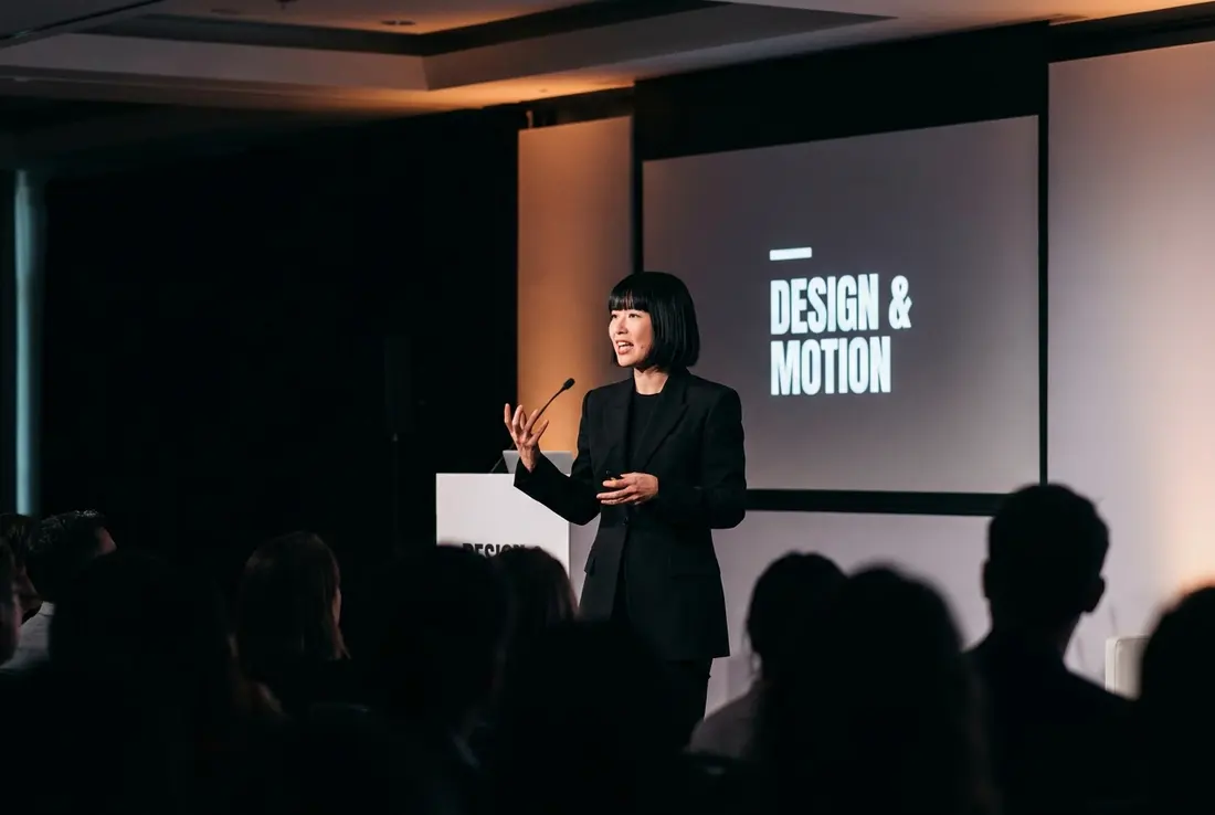 Generated image of Yuki Tanaka presenting at a conference